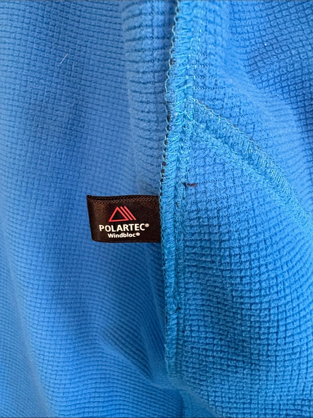 Patagonia Navy Blue Softshell Vest with Orange Accents